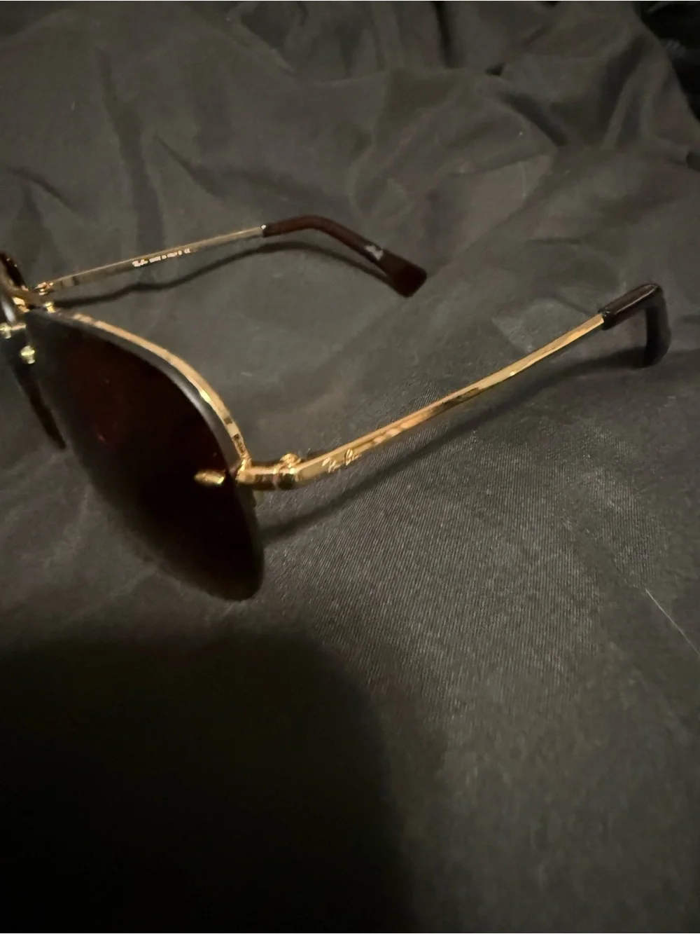 Ray-Ban Women's Gold Frame Dark Brown Lens Rimless Sunglasses
